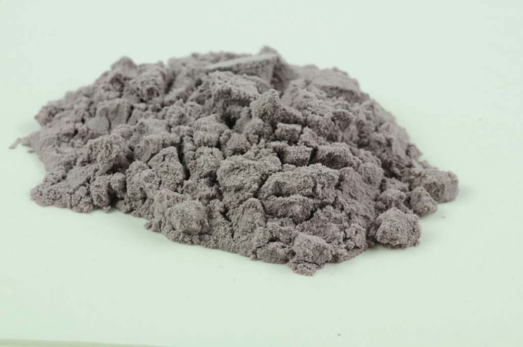 Barevné sklo, tmavě fialové načervenalé, průhledné, mletí 1, 100 g